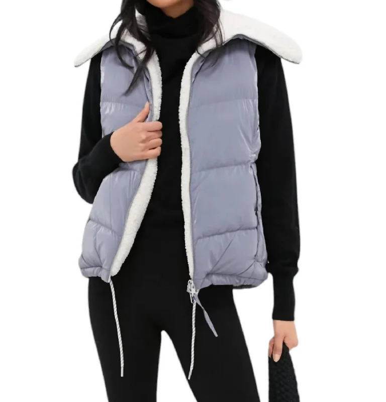 women's coats with adjustable sleeveswomen's coats with adjustable sleevesBrock Puffer Gilet In Blue Wind